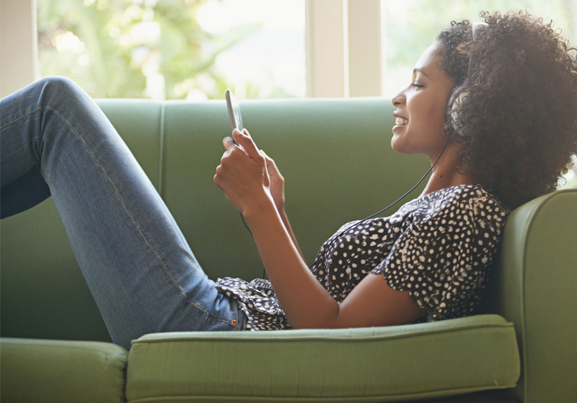 Patron streaming music from the Library in her living room