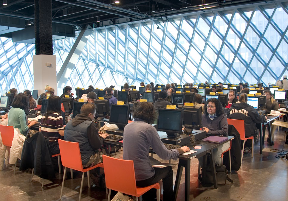 Patrons on public computers in the mixing chamber at the Central Library