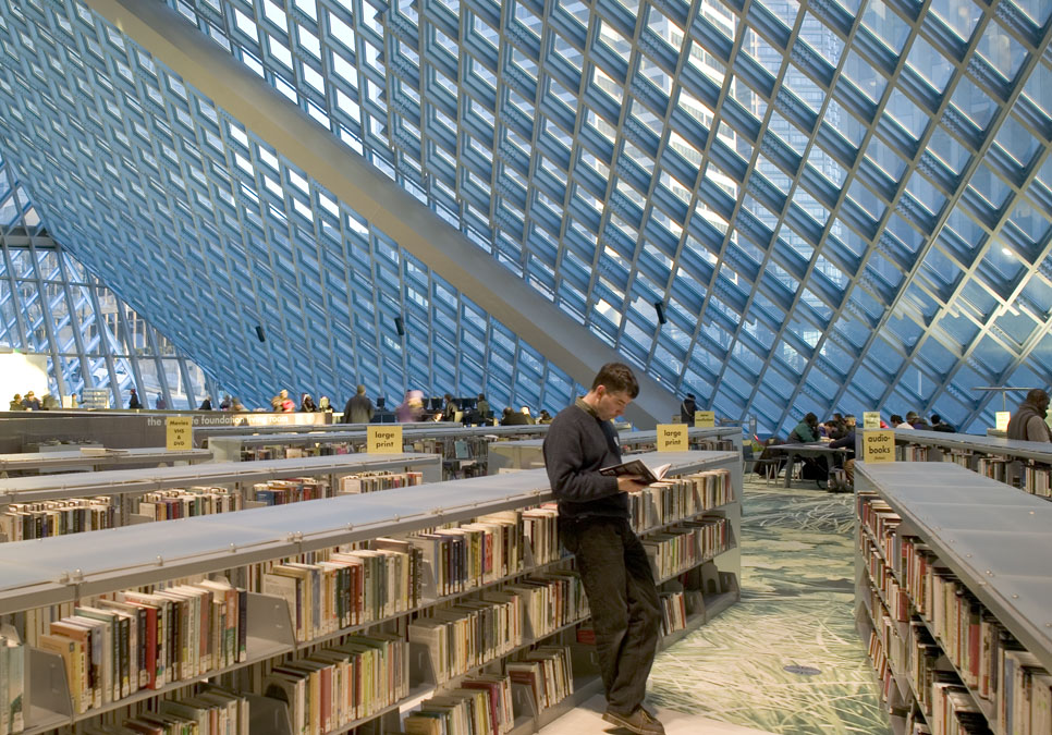 Patron reading in the living room at the Central Library