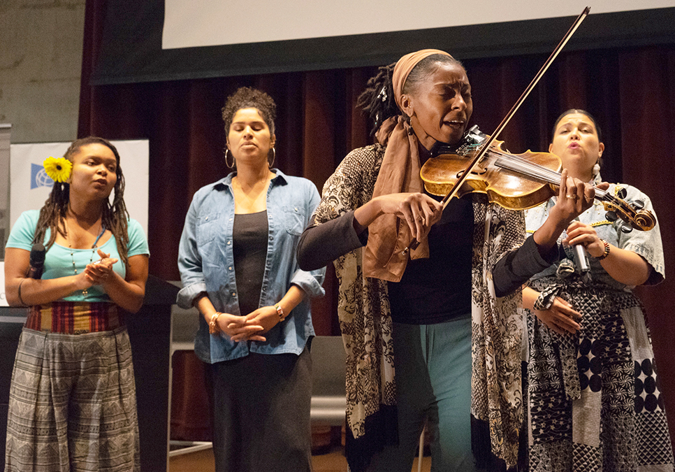 Musical performers in the Microsoft auditorium at the Central Library