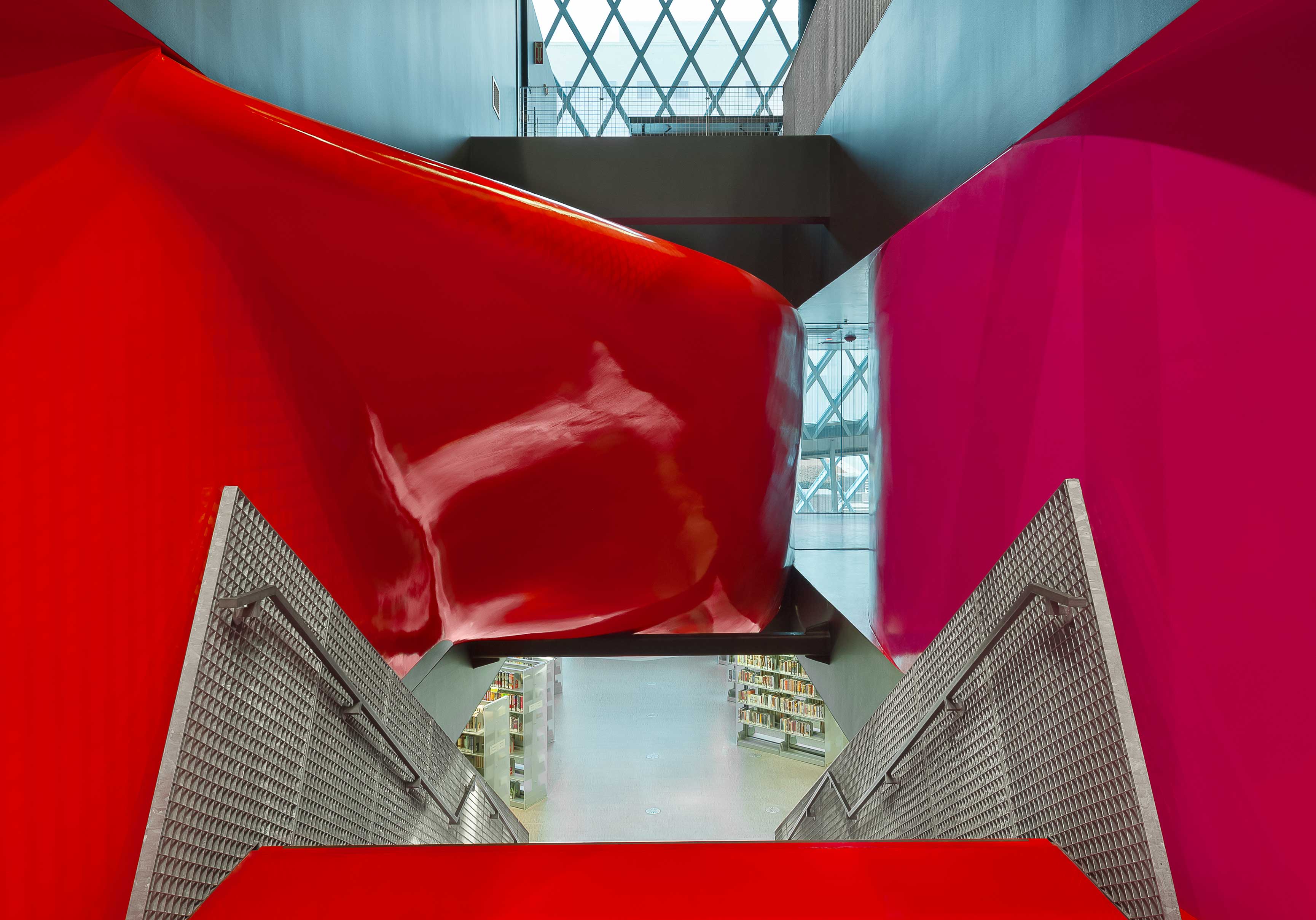 Photo of a red stairwell.