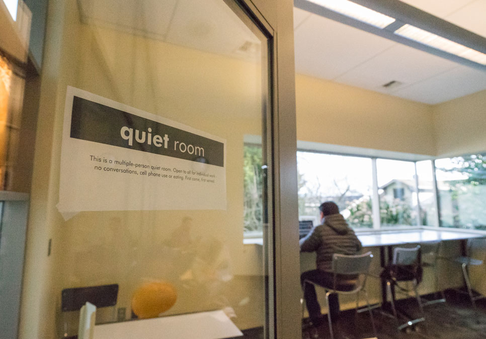 Library patron using the study room area at the Greenwood Branch