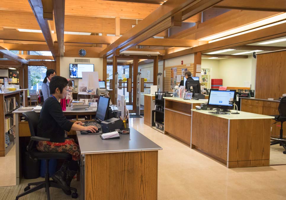 Library staff at the service desk area at the Magnolia Branch