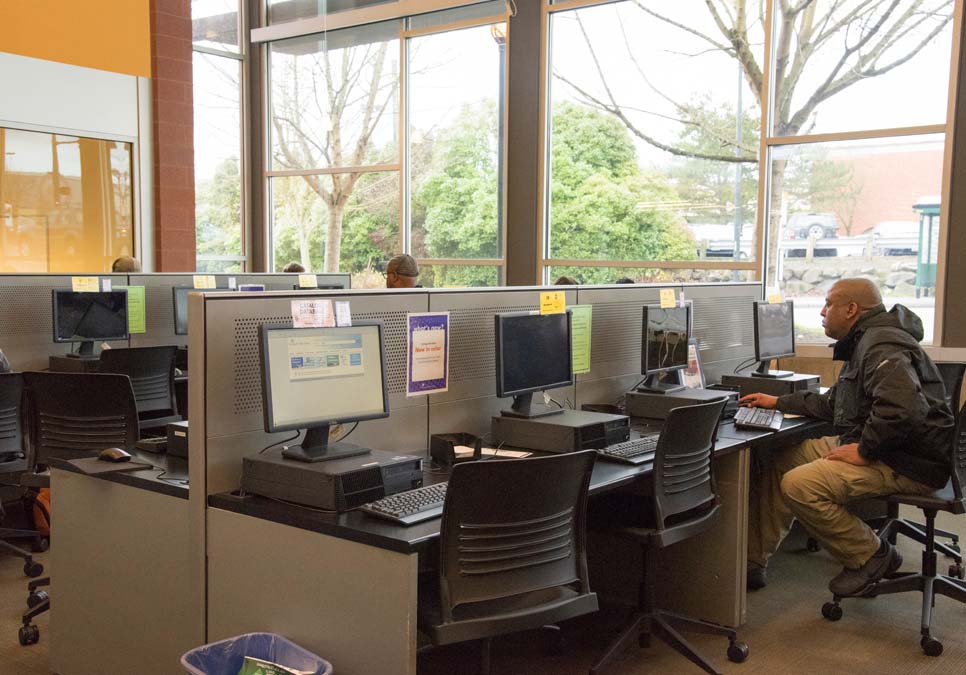 Library patrons using public computers at the Northgate Branch