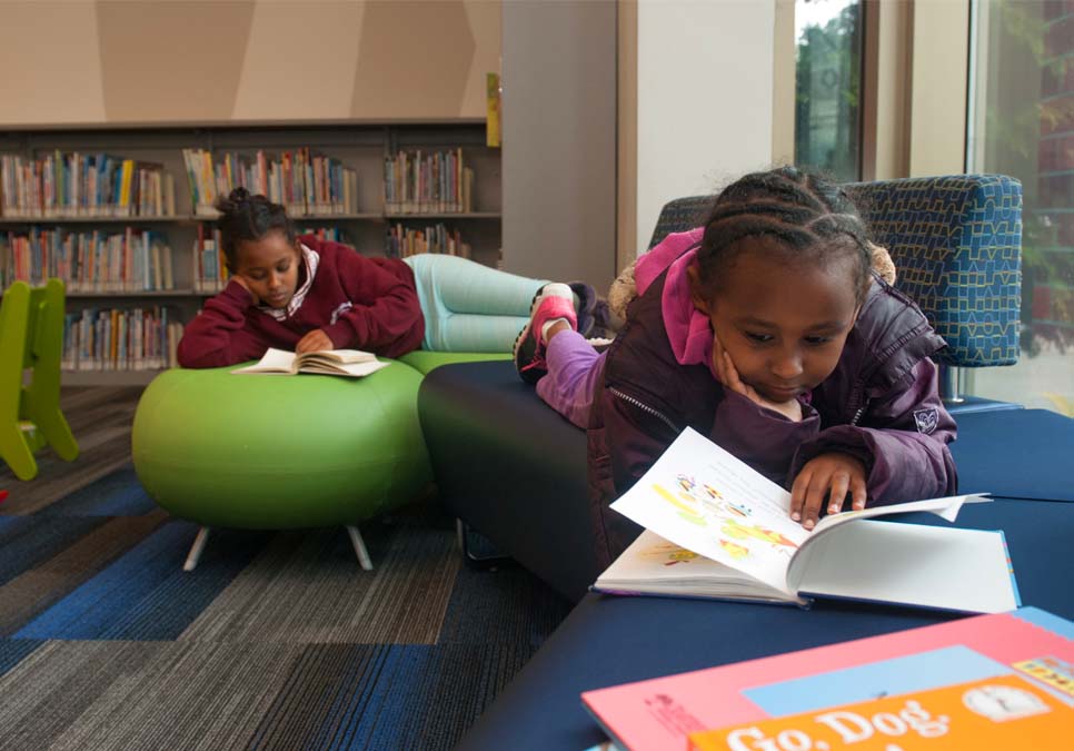 Children reading at the Rainier Beach Branch