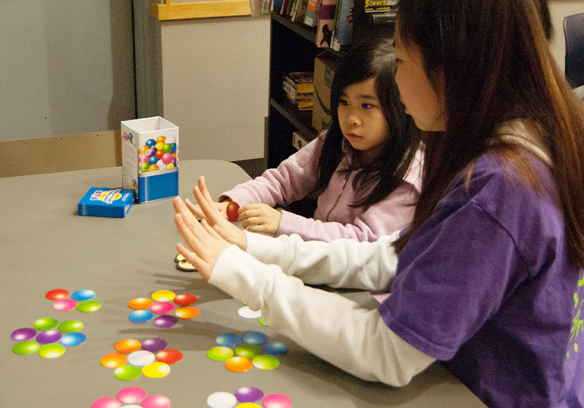 Person tutoring child.